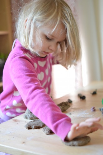 Fossil dough - girl playing with dough