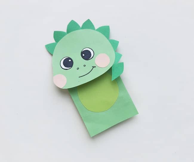 dinosaur puppet - head glued to paper bag