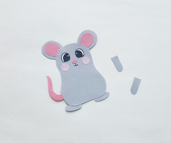 Mouse Papercraft - body of mouse cutout with face and eyes glued on, as well as the tail