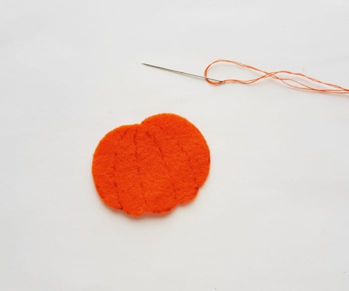 felt pumpkin craft - step two: pumpkin and needle with thread