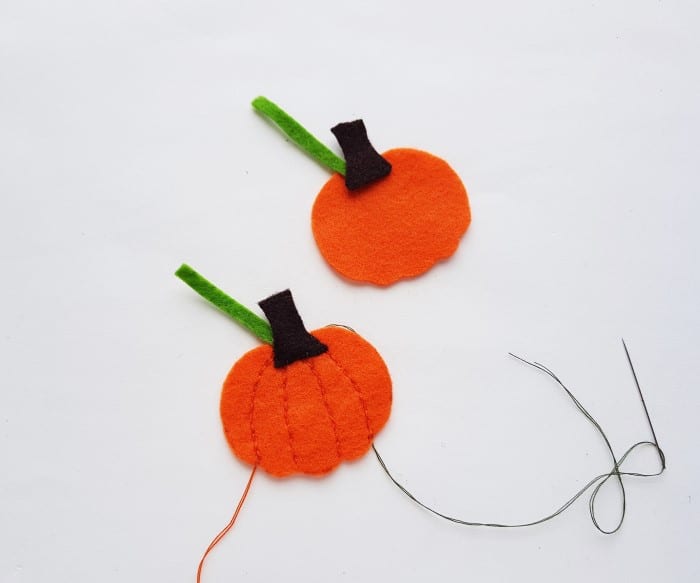 felt pumpkin craft - step four: top of pumpkin stitched to pumpkin