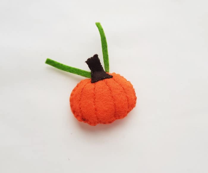 felt pumpkin craft - step seven: felt craft stuffed with cotton