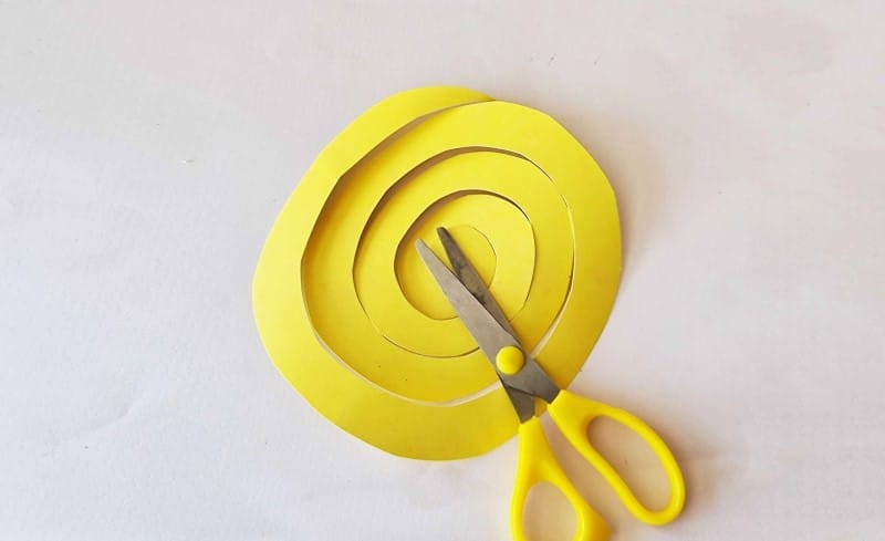 Twirling piece of yellow paper